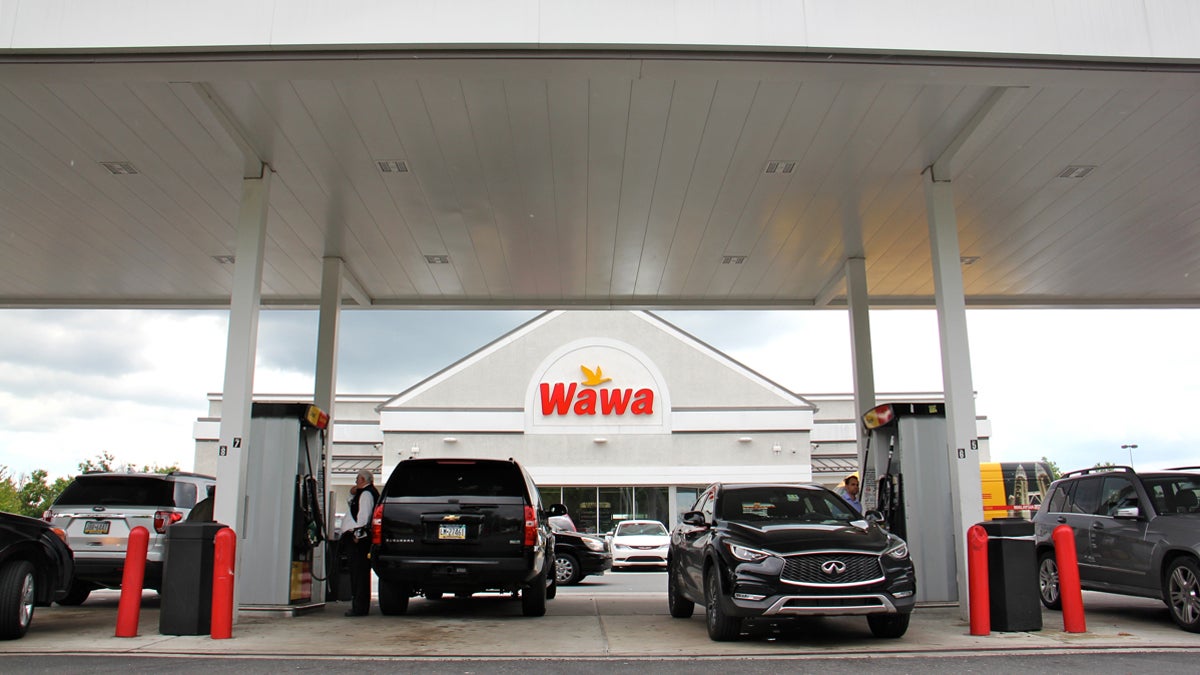  Customers fuel up at the Wawa on Bartram Avenue in Southwest Philadelphia, Pa. (Emma Lee/WHYY) 