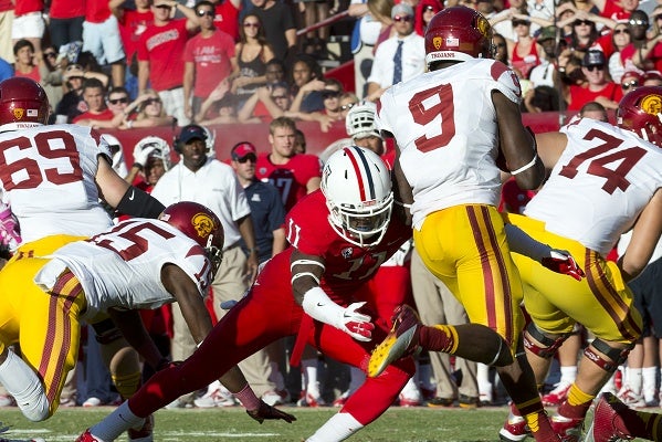 <p><p>Will Parks, the former Germantown Bear now playing for the University of Arizona Wildcats, lines up a tackle during the game against the University of Southern California. (Courtesy of Arizona Athletics)</p></p>
