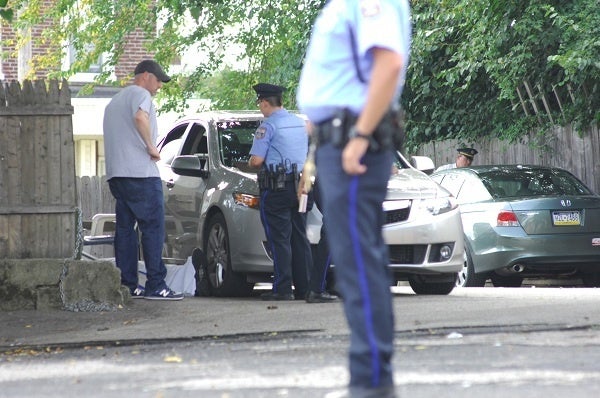 <p><p>Philadelphia Police on the scene of an August homicide on Limekiln Pike in the city's West Oak Lane neighborhood. (Bas Slabbers/for NewsWorks)</p></p>
