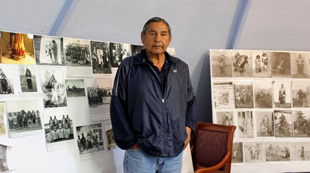  Russell Eagle Bear, the historic preservation officer for the Rosebud Sioux Tribe, looks at photos and maps in his office in Rosebud, S.D., of the Carlisle Indian Industrial School in Pennsylvania. Eagle Bear led a meeting last year between leaders of several tribes, including the Rosebud Sioux Tribe, and representatives from the U.S. Army to address the possibility of repatriating the remains of at least 10 Native American children who died away from their homes while being forced to attend the school more than a century ago. (Regina Garcia Cano/AP Photo) 