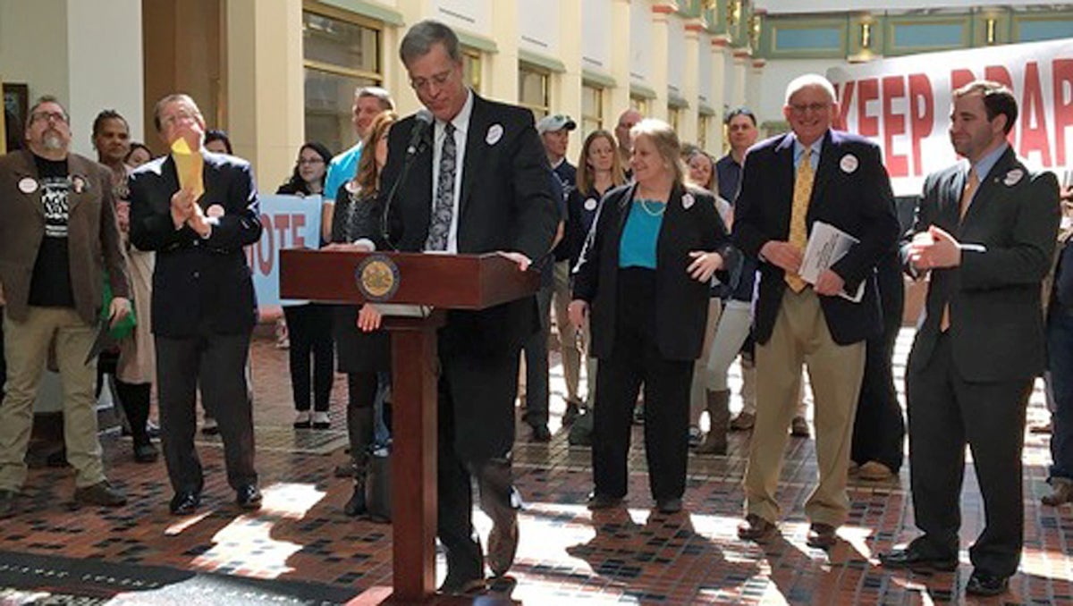  Following a House hearing on the proposed merger, former secretary Gary Tennis speaks at a rally in favor of maintaining a full Department of Drug and Alcohol Programs. (Katie Meyer/WITF) 