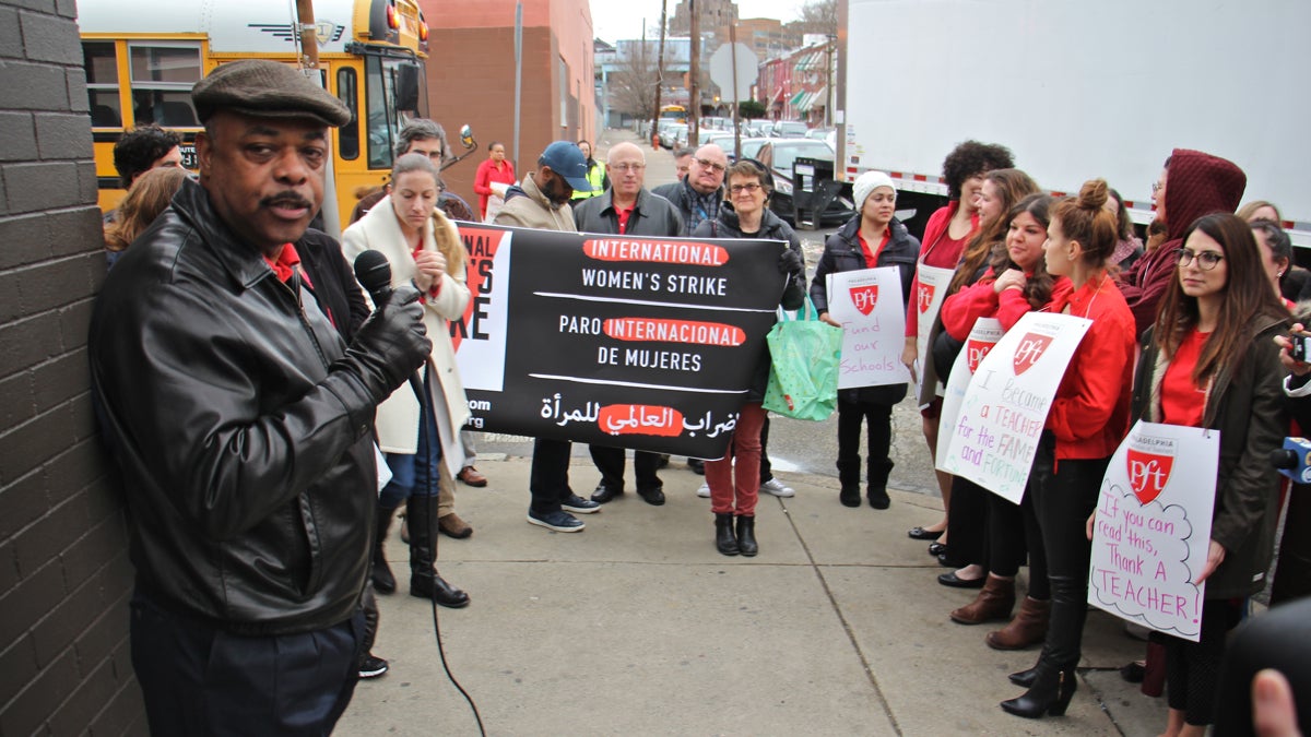  Philadelphia Federation of Teachers President Jerry Jordan (left) speaks to a gathering outside Henry A. Brown Elementary School in Kensington. The group used International Women's Day to highlight the fact that 75 percent of PFT members are women and they have been working without a contract for more than three years. (Emma Lee/WHYY) 