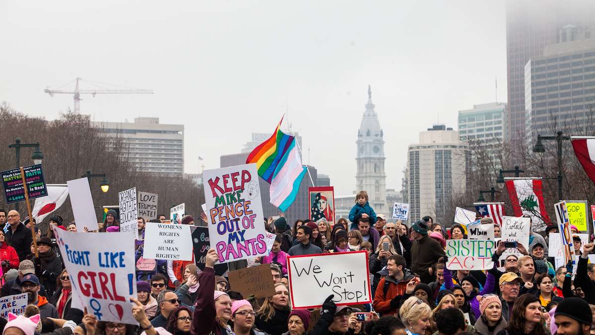 Protesters are shown gathered on the Benjamin Franklin Parkway for the Women's March in Philadelphia on Saturday, Jan 21, 2017. (Brad Larrison for WHYY) 