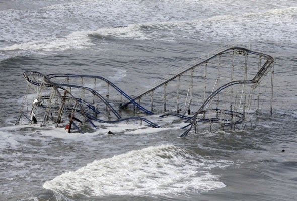 <p><p>Waves wash over a roller coaster from a Seaside Heights, N.J. amusement park that fell in the Atlantic Ocean during superstorm Sandy on Wednesday, Oct. 31, 2012. (AP Photo/Mike Groll)</p></p>
