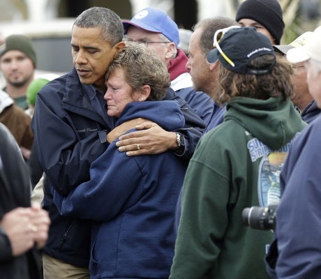 <p><p>President Obama, left, embraces Donna Vanzant, right, on Oct. 31, 2012 in Brigantine, N.J. Vanzant is a owner of North Point Marina, which was damaged by the storm. (AP Photo/Pablo Martinez Monsivais)</p></p>
