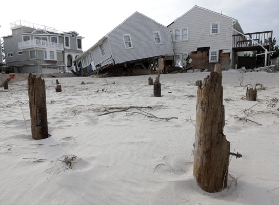 <p><p>A house that broke from its piers, front, during the storm rests against a neighboring house on Long Beach Island, N.J., Friday, Nov. 2, 2012. (AP Photo/Patrick Semansky)</p></p>
