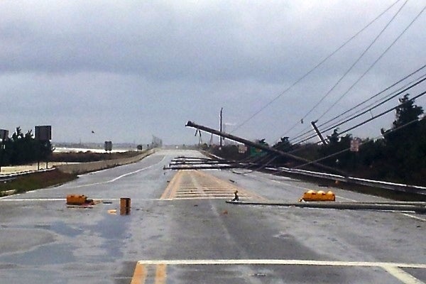 <p><p><span style="color: #000000; font-family: Arial, Helvetica, sans-serif; background-color: #ffffff;">Power lines block Ocean Drive in Longport, New Jersey, Tuesday, October 30, 2012. (Tom MacDonld/WHYY)</span></p></p>
