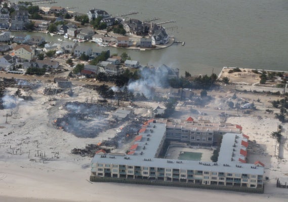 <p>The aerial view shows storm damage over the Atlantic Coast in Seaside Heights, N.J.,  Wednesday, Oct. 31, 2012, taken from a helicopter traveling behind the helicopter carrying President Obama and New Jersey Gov. Chris Christie, as they viewed storm damage from superstorm Sandy.   (AP Photo/Doug Mills, The New York Times, Pool)</p>

