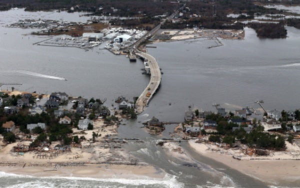 <p><p>This aerial photo made from a helicopter shows storm damage from Sandy over the Atlantic Coast in Mantoloking, N.J., Wednesday, Oct. 31, 2012. (AP Photo/Doug Mills, Pool)</p></p>
