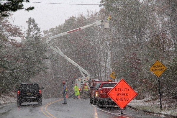 <p><p>Utility workers in Millstone, N.J. work to restore power lost because of Hurricane Sandy even as a nor'easter strikes. (Emma Lee/for NewsWorks)</p></p>
