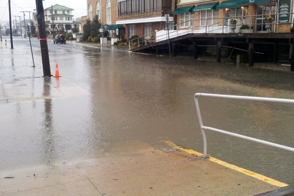 <p><p>Low-level flooding begins on 11th Street in Ocean City. Photo 1:10 p.m. (Tom Mac Donald/WHYY)</p></p>
