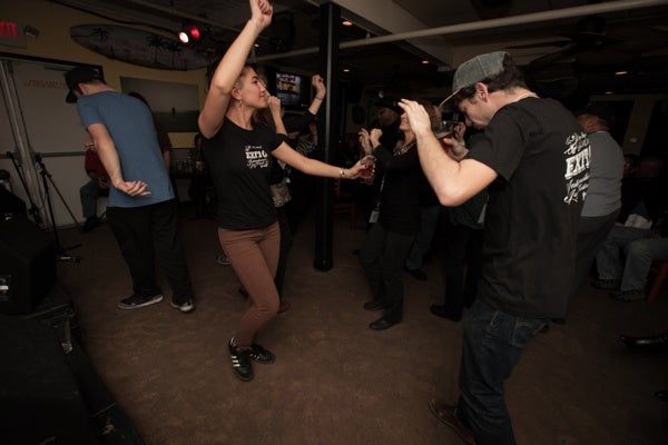 <p>Dancing to brass band music performerd by the Stooges at Cabanas. (Howard Pitkow/for Newsworks)</p>
