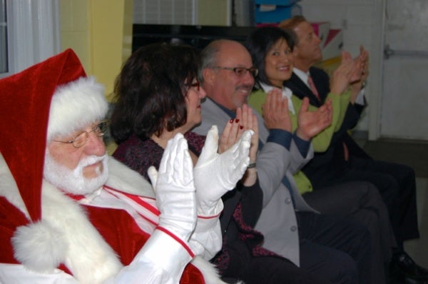 <p>Santa together with the Township Council and Mayor Cahn applaud the talented youth (Natavan Werbock/for NewsWorks)</p>

