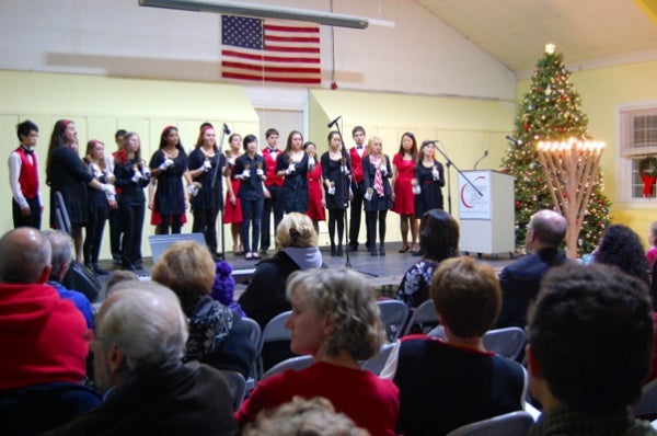 <p>East High School, Belles of East and the Madrigals spread the holiday cheer with classic Christmas tunes (Natavan Werbock/for NewsWorks)</p>
