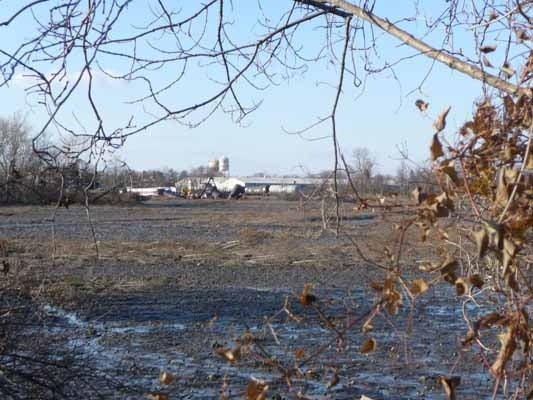 <p><p>The train accident can easily be seen from a nearby road outside of the evacuation zone in Paulsboro, N.J. (Alan Tu/WHYY)</p></p>
