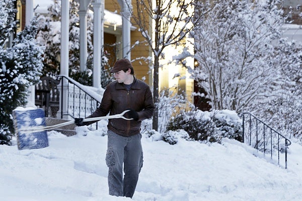 <p><p>Eric Weir shovels snow Sat, Feb. 9, 2013, near Newtown, Pa. (AP Photo/Mel Evans)</p></p>
