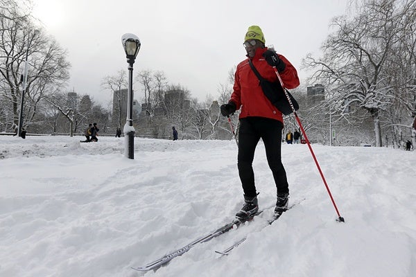 <p>Fred Graham cross country skis in New York's Central Park,  Saturday, Feb. 9, 2013. In New York City, the snow total in Central Park was 11.4 inches by 8 a.m.  (AP Photo/Richard Drew)</p>
