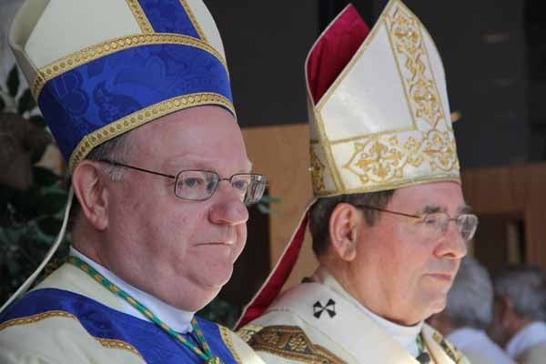 <p>Bishop Dennis J. Sullivan and Archbishop John Myers of Newark watch as the procession files into St. Agnes Church. (Emma Lee/for NewsWorks)</p>

