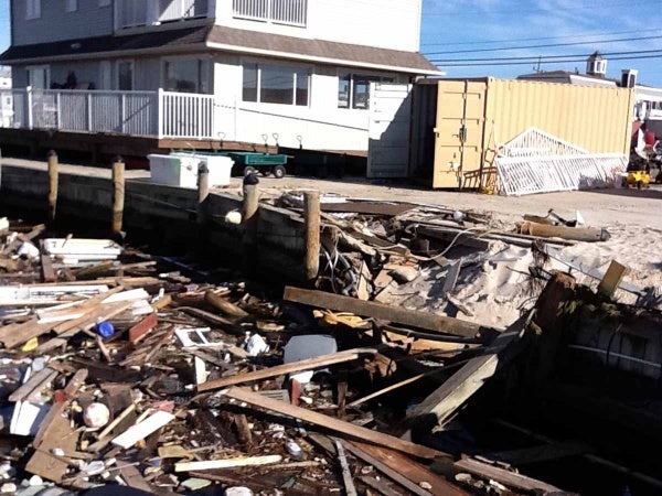 <p><p>As tons of debris washed into the water the marina's bulkhead was damaged. The first floor of the marina office building flooded. (Photo courtesy of Jimmy Ryan)</p></p>
