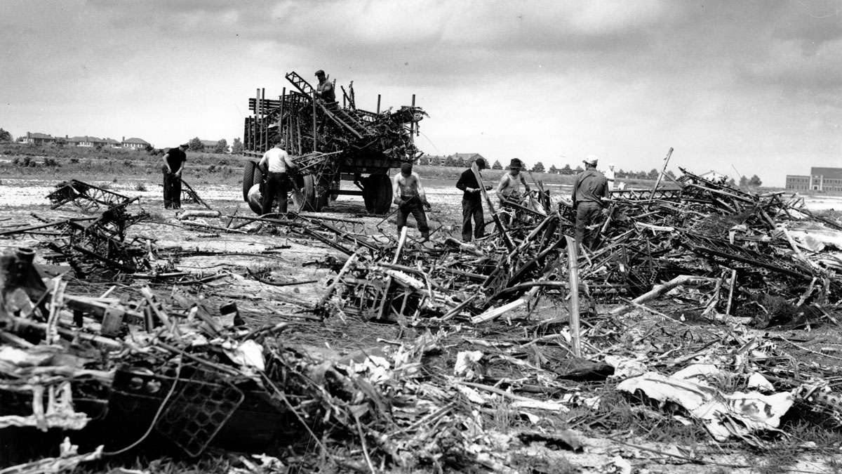 The remains of the wreckage of the German Zeppelin Hindenburg are removed from the U.S. Naval field in Lakehurst, N.J., on May 15, 1937. The airship exploded mid-air prior to landing May 6.