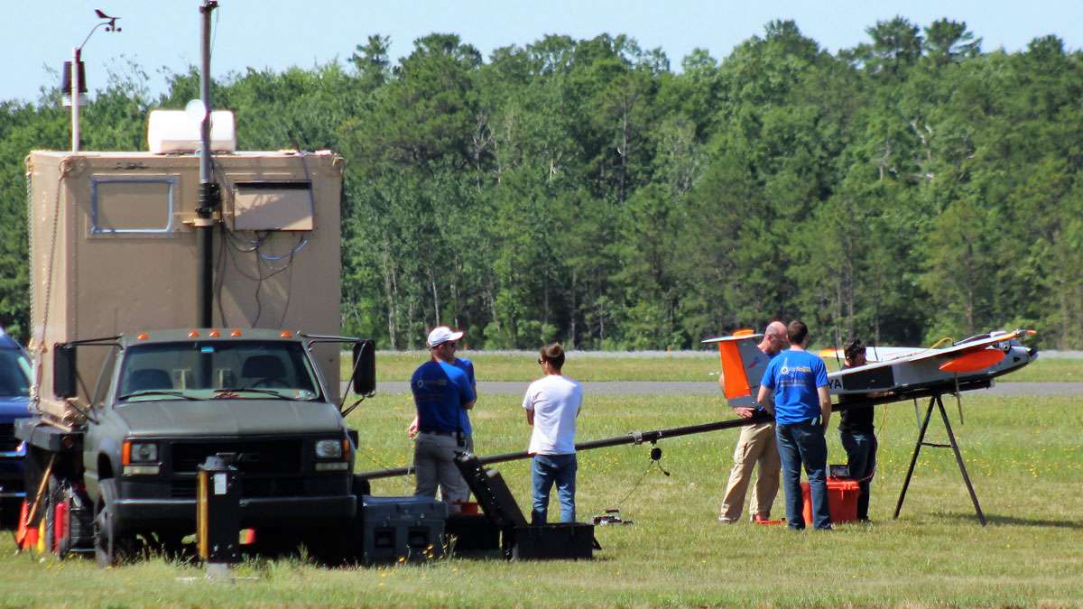 Crews prepare the RS-20 for an catapult launch using highly compressed air.