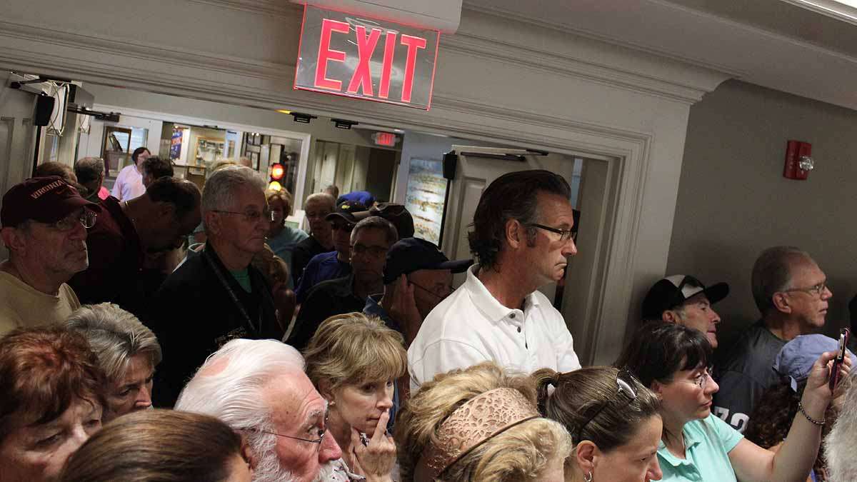 Margate residents jammed today's hearing room to discuss whether legal action should be taken to stop the dune building.