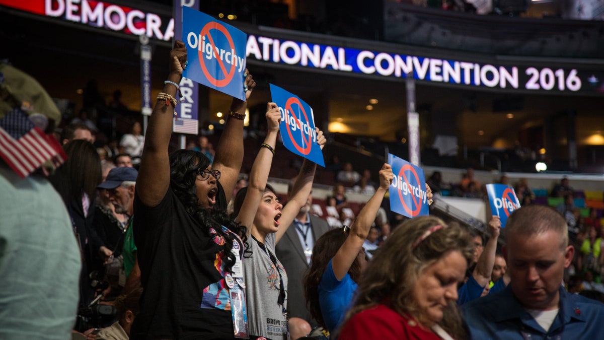 Bernie Sanders delegates express their dissatisfaction on day three of the Democratic National Convention in Philadelphia. (Emily Cohen for NewsWorks) 