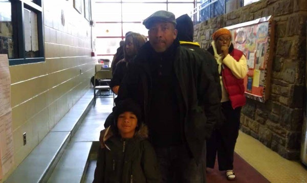 <p><p>In effort to show his grandson one responsibility that comes with being an adult, Bruce Osbourne brought him with him to vote at the Charles M. Finley Recreation Center. (Yasmein James/for NewsWorks)</p></p>
