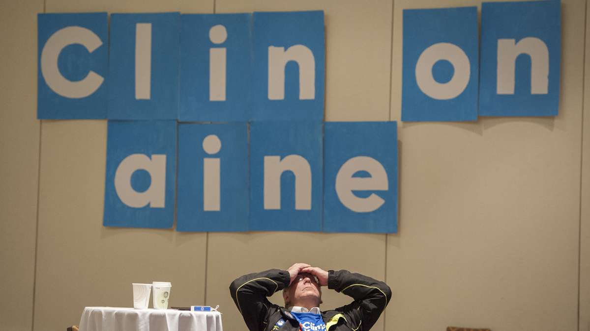 After midnight, Donald Morrison waits for Katie McGinty's concession speech at her campaign headquarters in Philadelphia. (Jonathan Wilson for Newsworks)