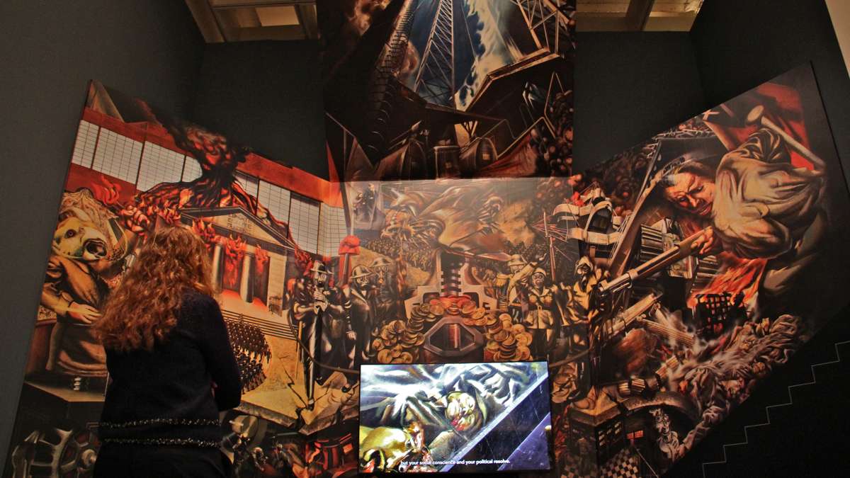''Portrait of the Bourgeoisie'' by David Alfaro Siqueiros occupies a stairwell at the Mexican Electricians' Syndicate in Mexico City. It was recreated at the Philadelphia Museum of Art for the exhibit, ''Paint the Revolution.'' (Emma Lee/WHYY)