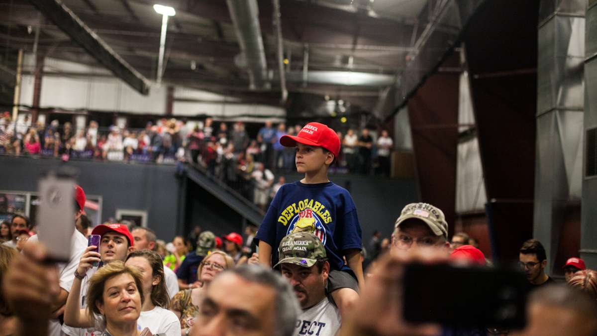 Supporters of Donald Trump watch the Republican nominee for president make a campaign speech in Newtown, Pennsylvania, on Friday, Oct. 21, 2016. (Brad Larrison for NewsWorks)