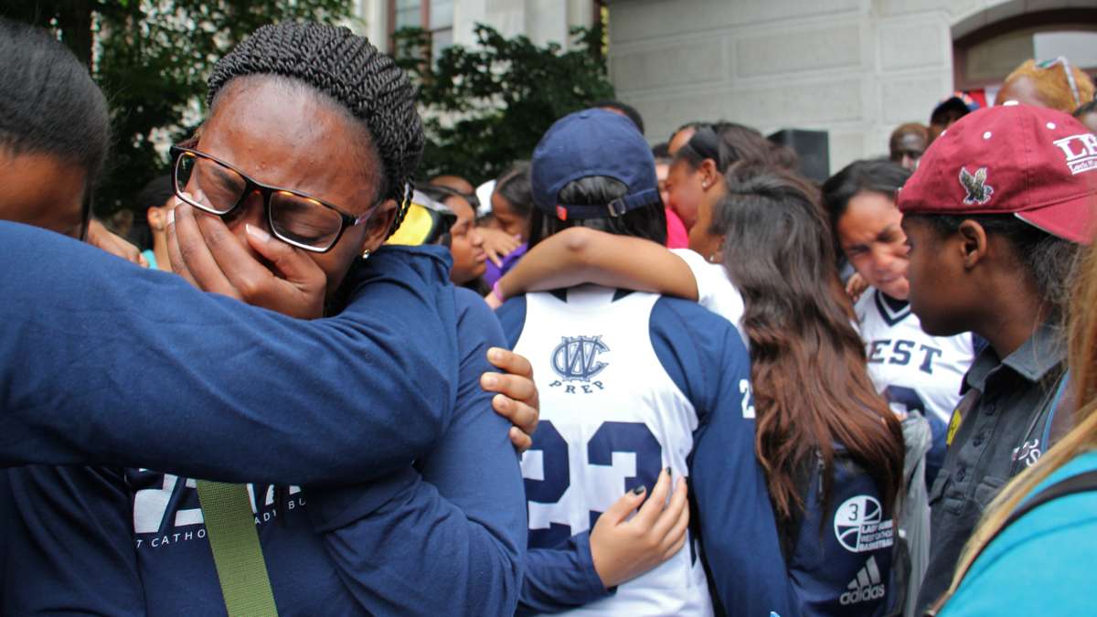 Students and alumni of West Catholic High School mourn the death of 18-year-old Akyra Murray, a recent graduate and basketball standout who was vacationing with her family in Orlando when she was killed at the Pulse night club. (Emma Lee/WHYY)