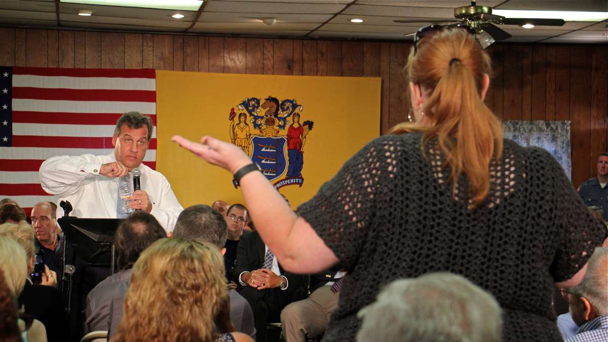 Gov. Chris Christie spars with a constituent during a town hall in Bordentown, New Jersey. Christie lost his position as head of the Trump transition team on Nov. 11, 2016, five days after two aides were convicted in the Bridgegate scandal. (Emma Lee/WHYY)