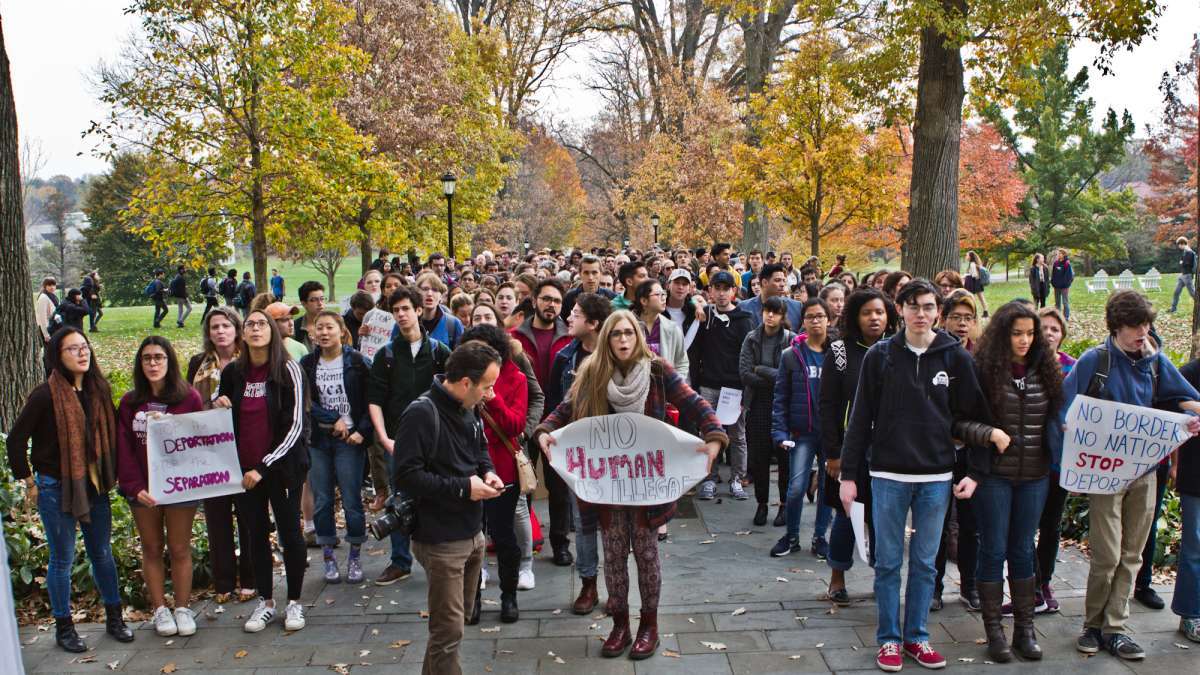 Students walk out on Nov. 16, 2016, to demand that their school, Swarthmore College, become a sanctuary campus. (Kimberly Paynter/WHYY)