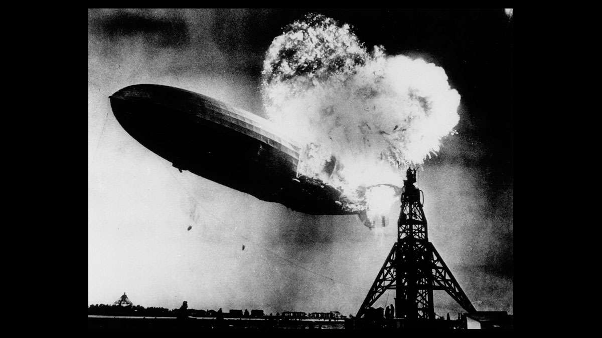 File - This May 6, 1937 file photo, taken at almost the split second that the Hindenburg exploded, shows the 804-foot German zeppelin just before the second and third explosions send the ship crashing to the earth over the Lakehurst Naval Air Station in Lakehurst, N.J. (AP Photo)