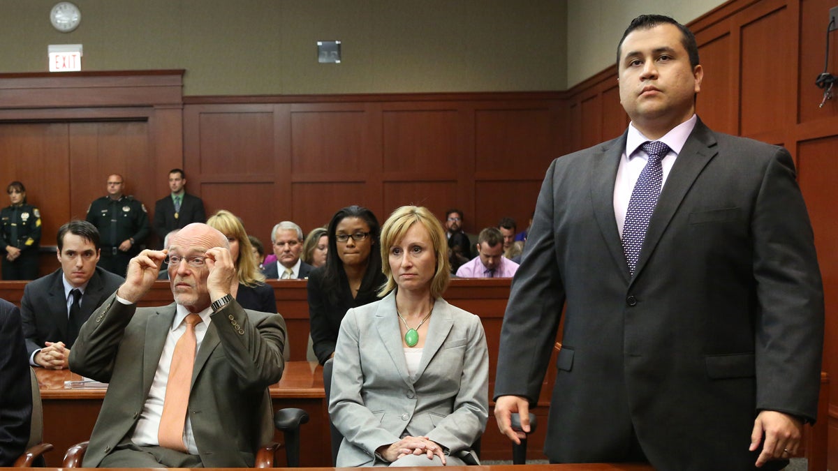  George Zimmerman stand as the jury enters the courtroom at the Seminole Circuit Court, in Sanford, Fla., Saturday, July  13, 2013. Neighborhood watch captain George Zimmerman was cleared of all charges Saturday in the shooting of Trayvon Martin.  Next to him are defense counsel Lorna Truett, and Don West.  (AP Photo/Orlando Sentinel, Joe Burbank, Pool) 