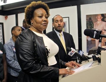 Rochelle Bilal (center), president of the Guardian Civic League, and Brian Mildenberg (right) attorney for a group of African American police officers, level charges of racism against the leadership at the Philadelphia narcotics unit. (