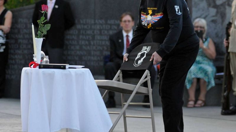 An empty chair is symbolically placed, concluding a ''Missing Man'' ceremony performed by members of the Philadelphia Vietnam Veterans Memorial Society, at the Memorial on Friday.