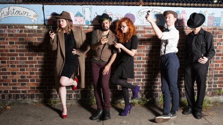  The cast of Tribe of Fools' 'Fishtown' poses in front of a sign in Fishtown. From left: Tara Demmy, Joseph Ahmed, Jenna Kuerzi, Zachary Chiero and Kyle Yackoski. (Photo courtesy Plate3 Photography)   