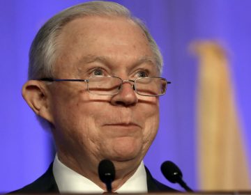 A federal judge bars Attorney General Jeff Sessions from  following through — at least for now — with his threat to withhold public safety grant money to Chicago, Philadelphia and other 