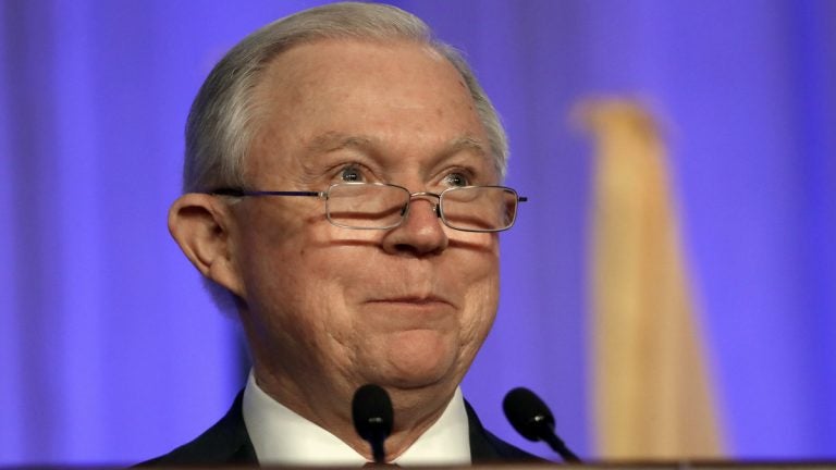 A federal judge bars Attorney General Jeff Sessions from  following through — at least for now — with his threat to withhold public safety grant money to Chicago, Philadelphia and other 