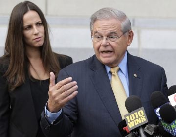  U.S. Sen. Bob Menendez talks to reporters last week as he arrives to court for his federal corruption trial in Newark, N.J., as his daughter Alicia Menendez looks on. (AP Photo/Seth Wenig, File) 