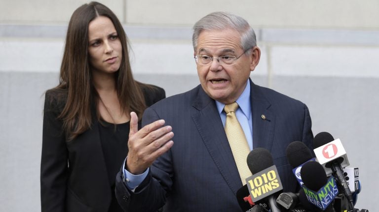  U.S. Sen. Bob Menendez talks to reporters last week as he arrives to court for his federal corruption trial in Newark, N.J., as his daughter Alicia Menendez looks on. (AP Photo/Seth Wenig, File) 