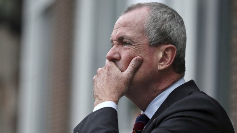 Democratic New Jersey gubernatorial candidate Phil Murphy listens to a question as he addresses a gathering outside Mercer County Community College on Monday in Trenton. Murphy said Monday that the tuition-free community college plan he's promising could cost $200 million. (AP Photo/Mel Evans)