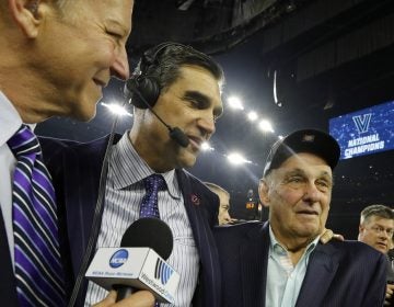  Villanova head coach Jay Wright, center, celebrates with 1985 Villanova coach Rollie Massimino, right, after the NCAA Final Four tournament college basketball championship game against North Carolina last year. Massimino, who led Villanova to the NCAA title in 1985, died Wednesday at 82. (AP Photo/David J. Phillip) 