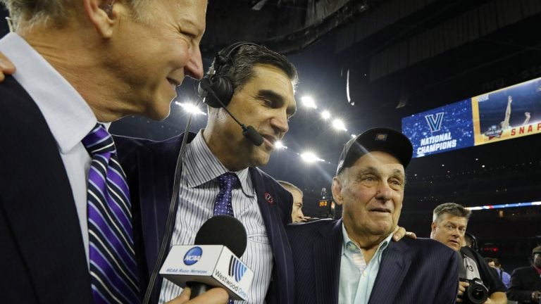  Villanova head coach Jay Wright, center, celebrates with 1985 Villanova coach Rollie Massimino, right, after the NCAA Final Four tournament college basketball championship game against North Carolina last year. Massimino, who led Villanova to the NCAA title in 1985, died Wednesday at 82. (AP Photo/David J. Phillip) 