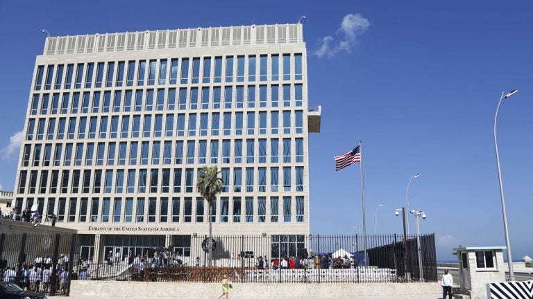  In this Aug. 14, 2015, file photo, a U.S. flag flies at the U.S. embassy in Havana, Cuba. U.S. investigators are chasing many theories about what’s harming American diplomats in Cuba, including a sonic attack, electromagnetic weapon or flawed spying device. (Desmond Boylan/AP Photo, File) 