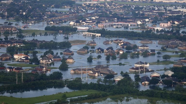  Floodwaters from Tropical Storm Harvey surround homes and businesses in Port Arthur, Texas, Thursday, Aug. 31, 2017. (Gerald Herbert/AP Photo) 