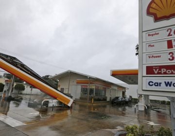 The metal canopy at a gasoline station is shown after it was overturned by high winds brought on by Hurricane Irma, Sunday, Sept. 10, 2017, in North Miami, Fla. (Wilfredo Lee/AP Photo)