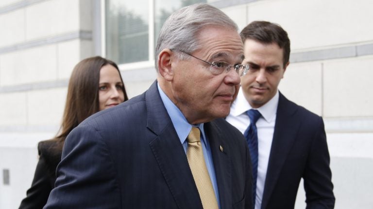  Sen. Bob Menendez, center, arrives at the courthouse with his children, Alicia Menendez and Robert Menendez Jr., in Newark, N.J., Wednesday, Sept. 6, 2017. (Seth Wenig/AP Photo) 